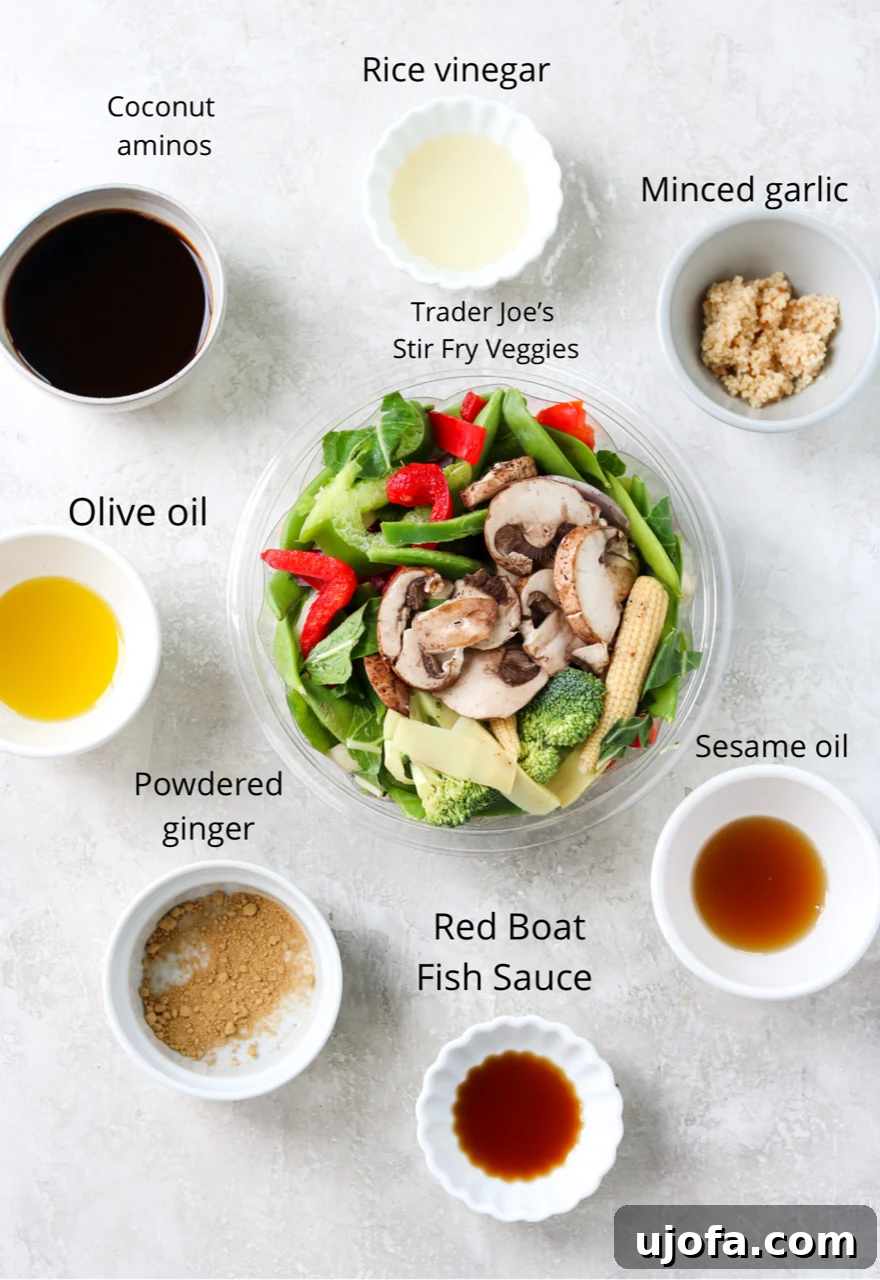 A vibrant flat lay showcasing all the fresh and essential ingredients neatly arranged for making a delicious Pad Pak recipe, each item clearly labeled for easy identification.