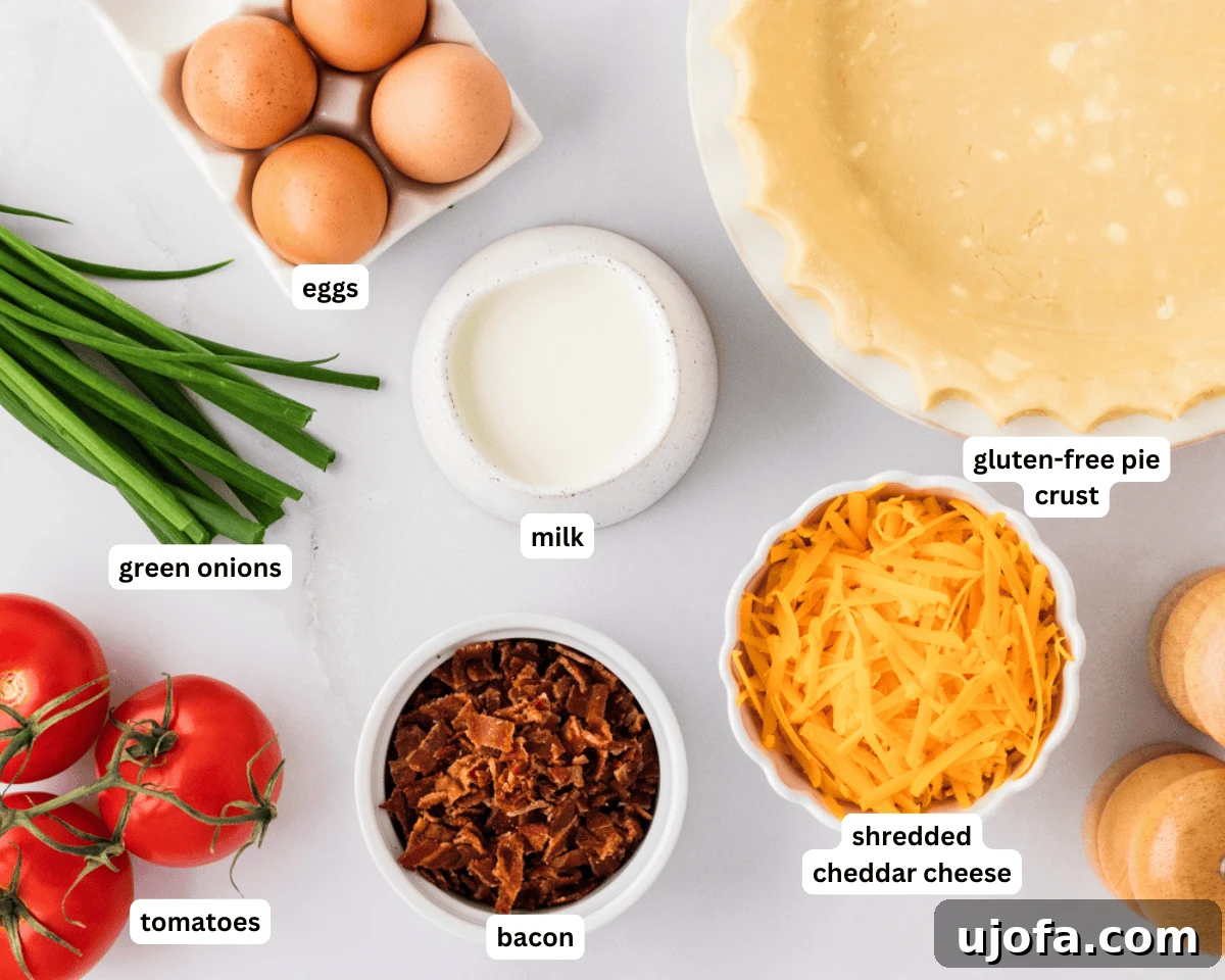 Ultimate Gluten-Free Quiche 4 All the fresh ingredients for gluten-free quiche laid out on a kitchen counter: a pie crust, eggs, half-and-half, bacon, tomatoes, green onions, and shredded cheddar cheese.
