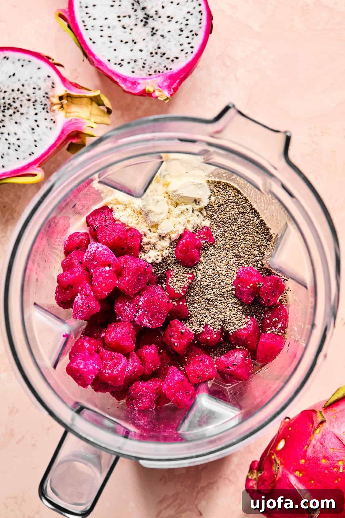 Dragonfruit Power-Up Smoothie 4 Frozen dragon fruit, banana slices, vanilla protein powder, chia seeds, and coconut water in a high-speed blender.