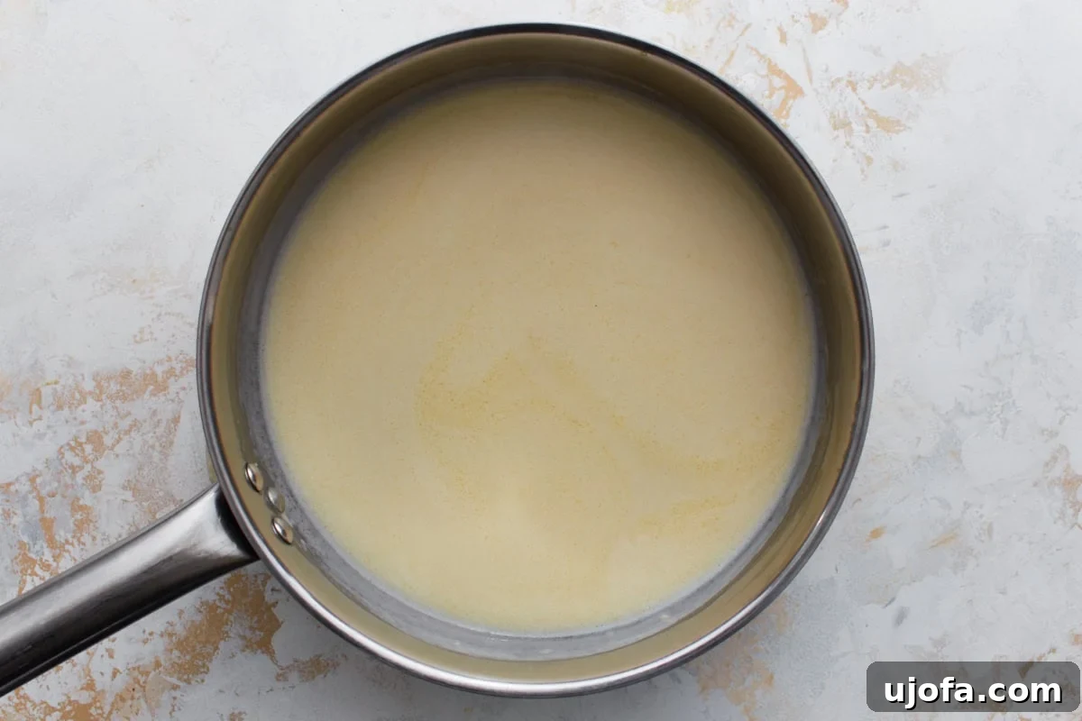 gluten free beer and milk combined with butter and flour to make gluten free beer cheese sauce