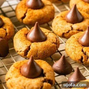 gluten free peanut butter blossoms on a cooling rack