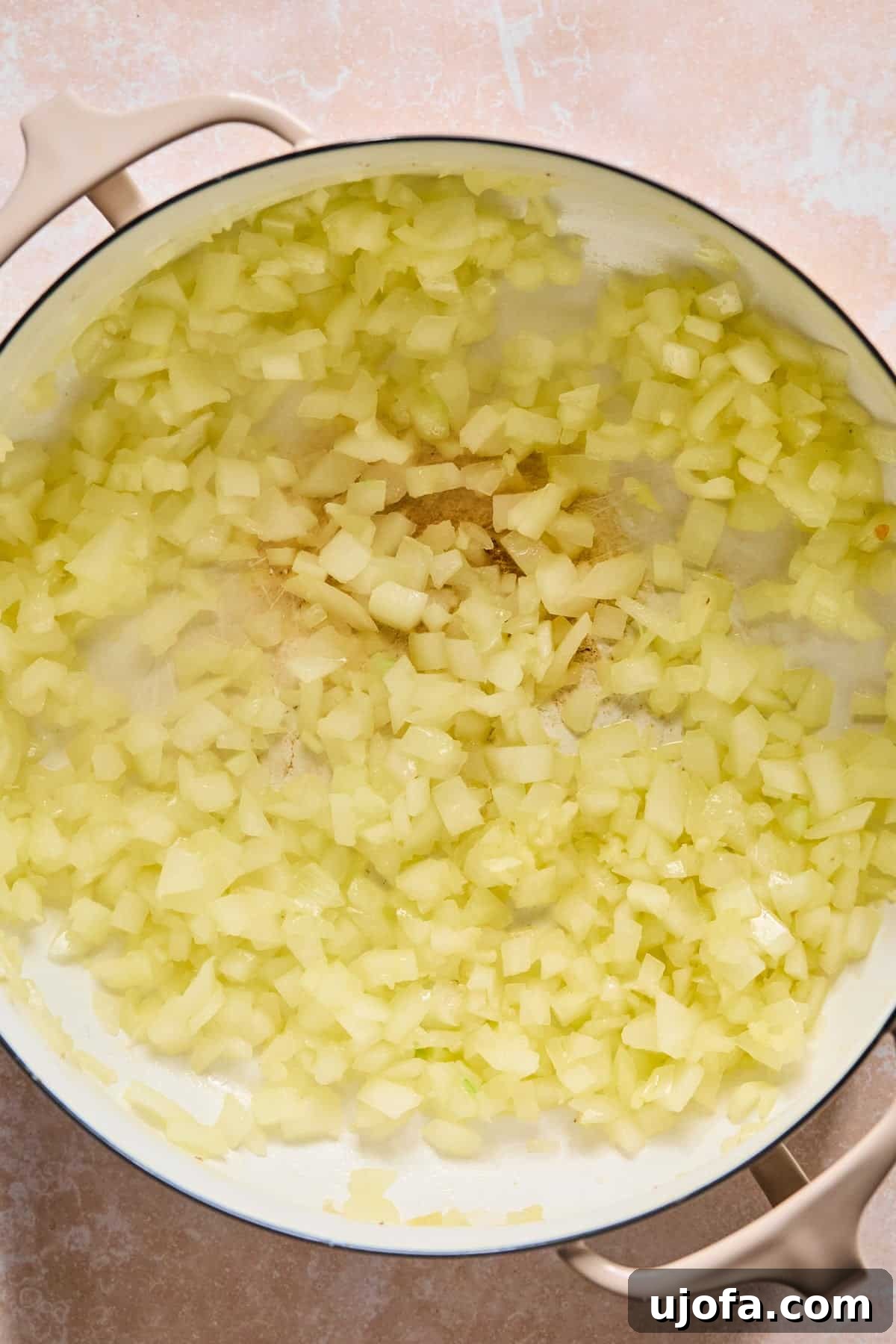 Hearty Shepherd's Pie Soup 5 Sautéing onion and garlic in a Dutch Oven.