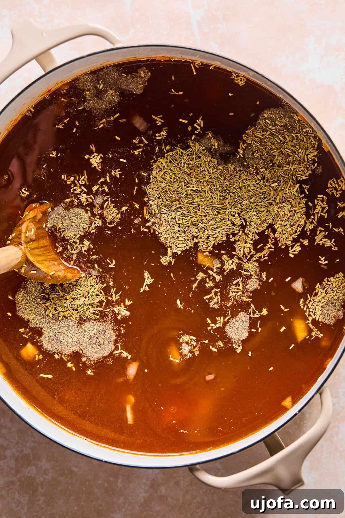 Hearty Shepherd's Pie Soup 7 Broth, herbs, and potatoes added to the pot.