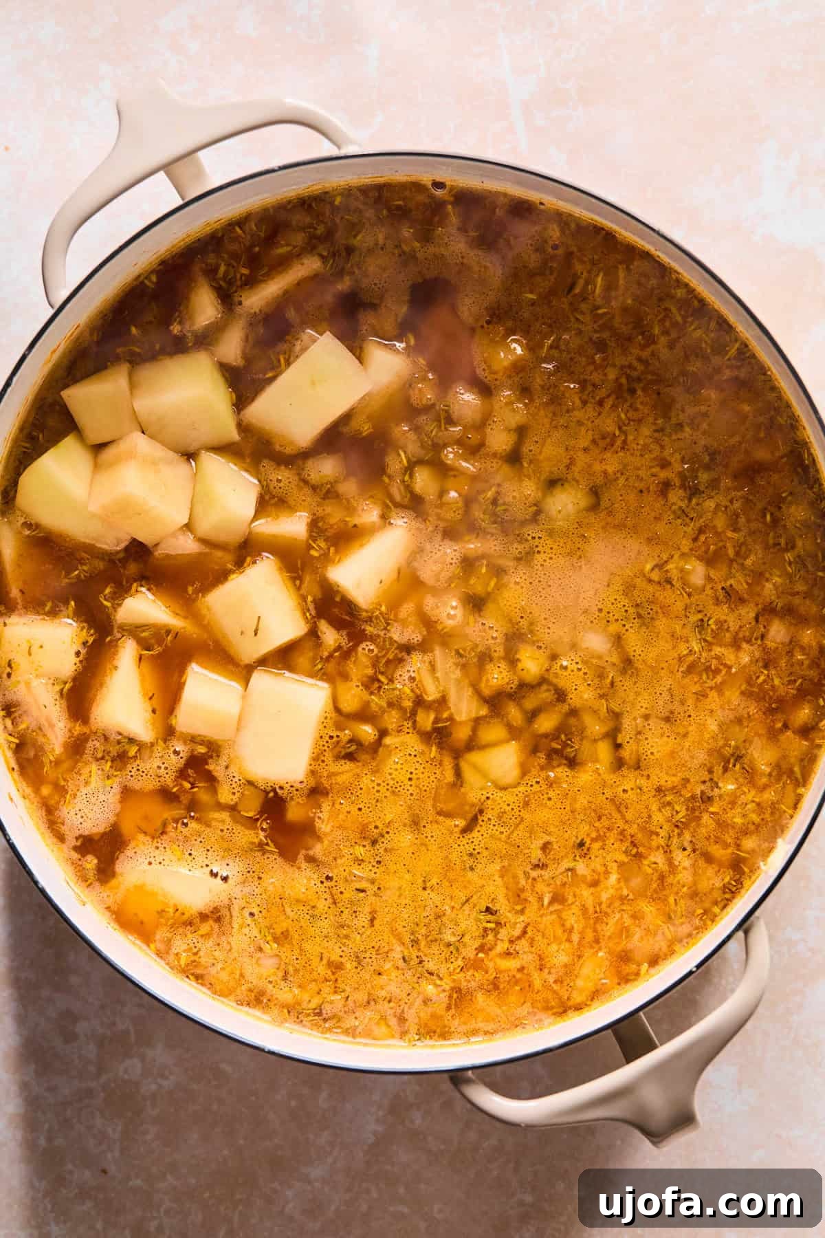 Hearty Shepherd's Pie Soup 8 Dutch Oven with soup ingredients.