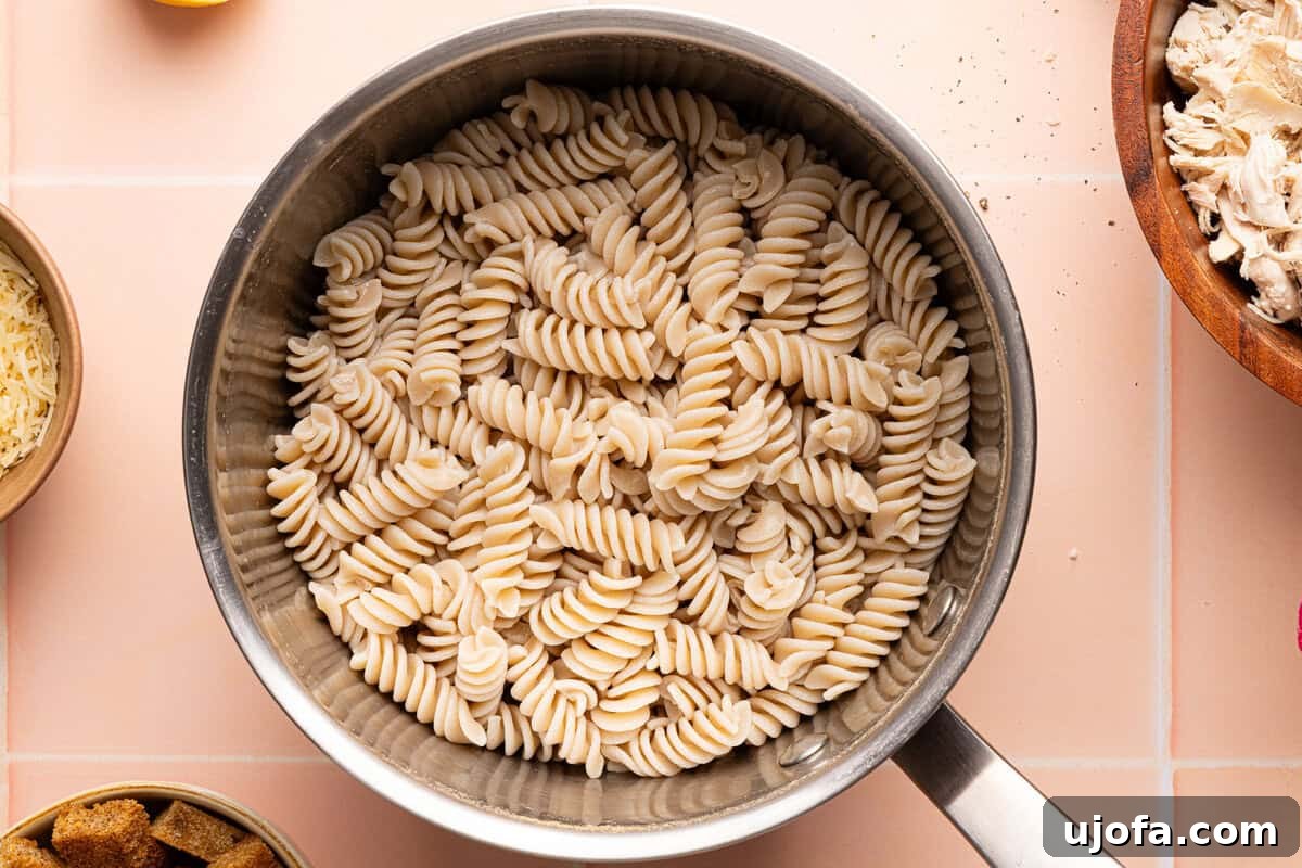 Effortless Gluten-Free Chicken Caesar Pasta Salad 4 gluten free pasta in a pot