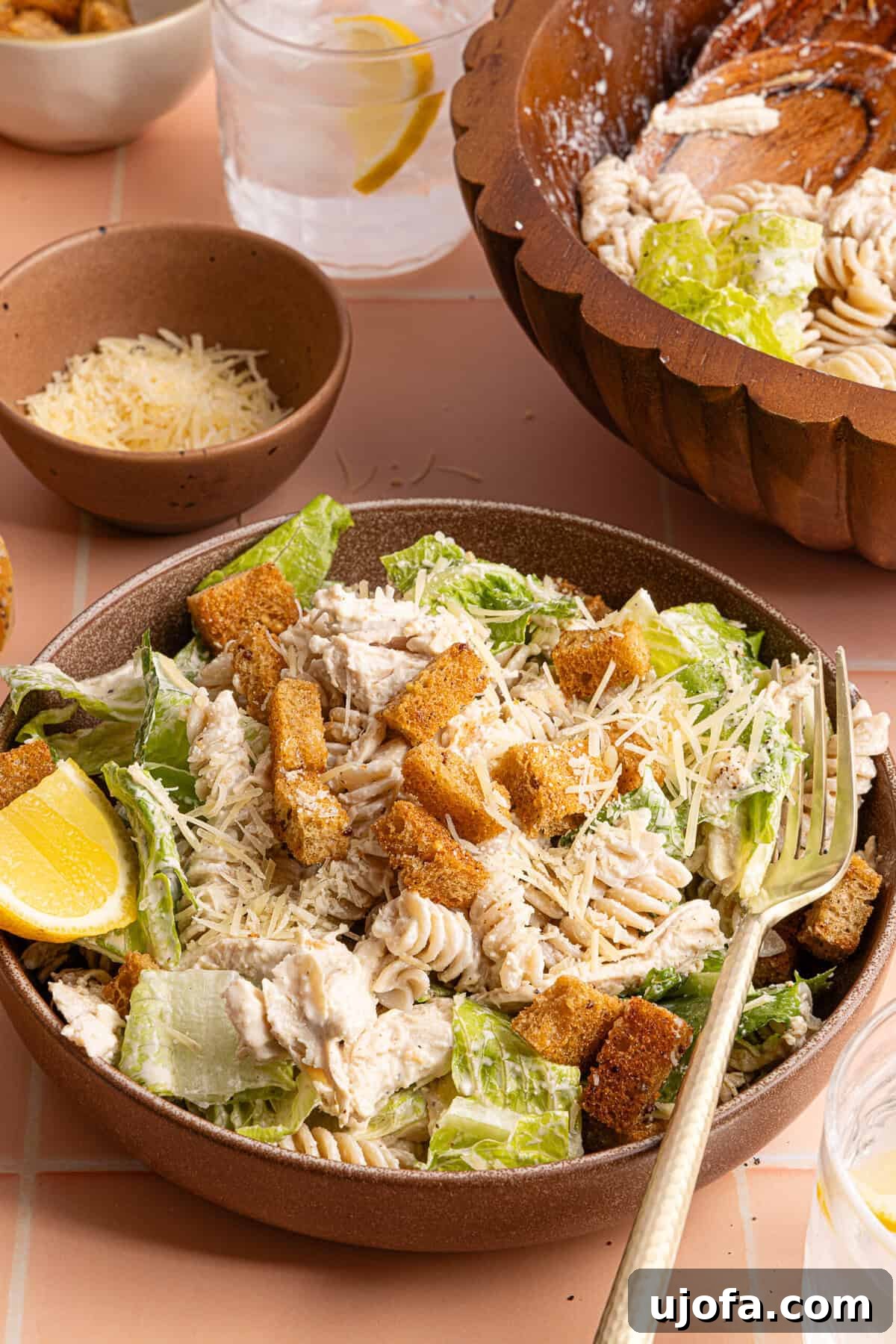 Effortless Gluten-Free Chicken Caesar Pasta Salad 10 a side view of a bowl of chicken caesar pasta salad