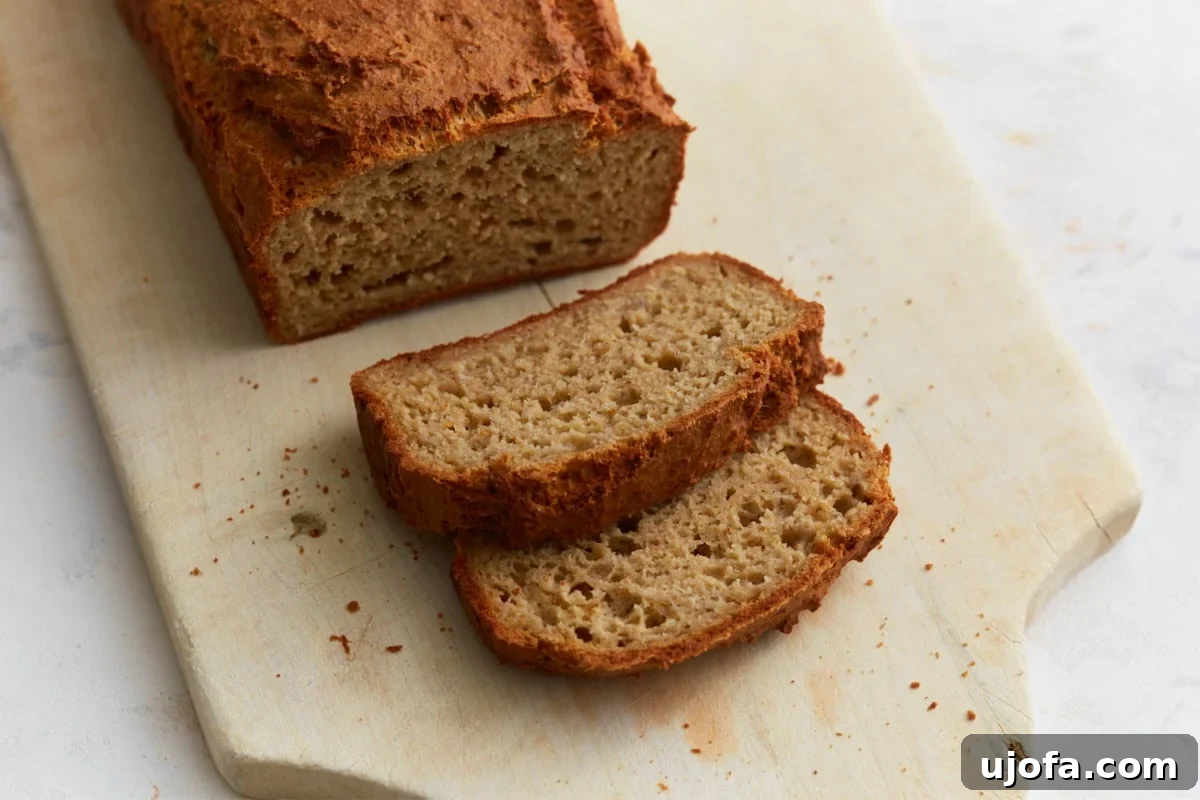 Wholesome Oat Bread 10 Stacked slices of oat flour bread showing soft interior and slightly dense texture
