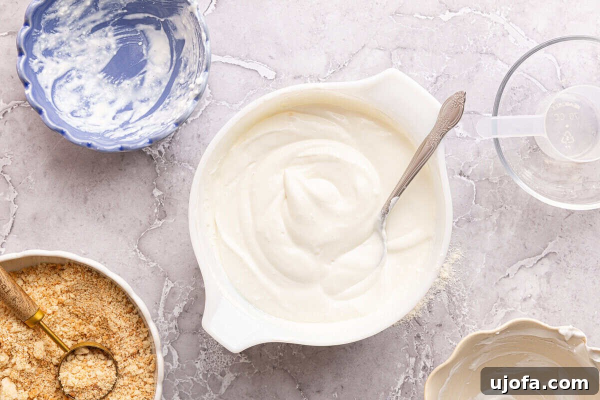 Protein-Packed Banana Pudding Cups for Muscle Fuel 5 a bowl of cheesecake filling