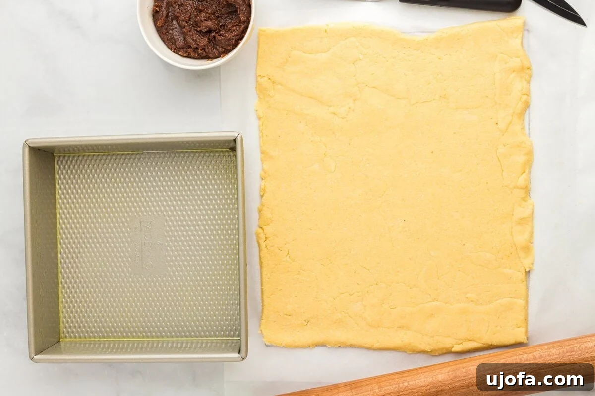 Rolled out coconut flour dough into a rectangle on parchment paper