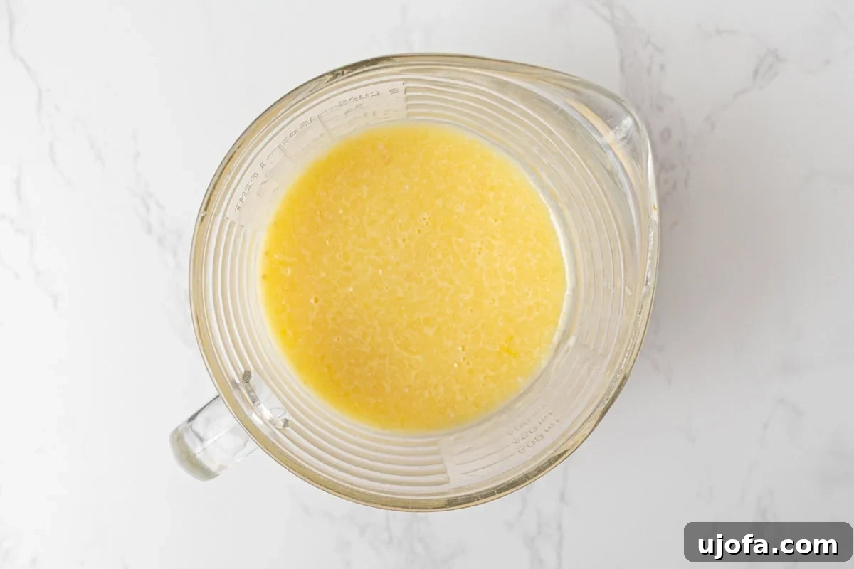 Coconut Flour Waffles: Light, Crispy Grain-Free Recipe 5 Milk, eggs, melted butter, and vanilla whisked together in a measuring cup for coconut flour waffle batter