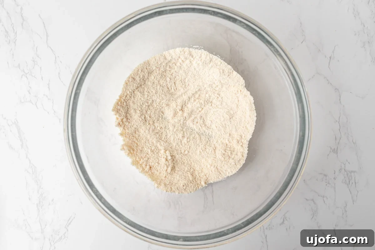 Coconut Flour Waffles: Light, Crispy Grain-Free Recipe 6 Coconut flour in a glass mixing bowl ready to be combined for gluten-free waffle batter