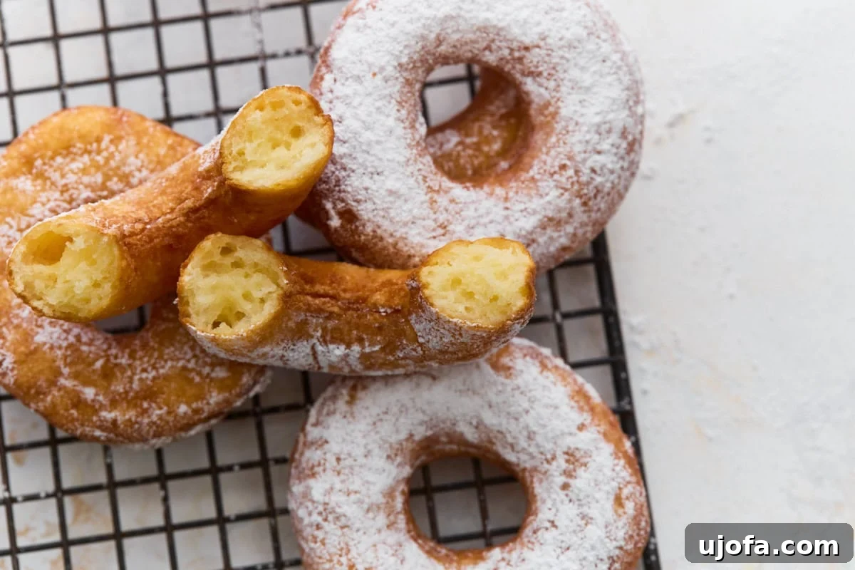 Gluten-Free Mochi Donuts Recipe: Chewy, Crispy & Irresistible 12 Gluten-free mochi donut cut open to show the soft and chewy center texture