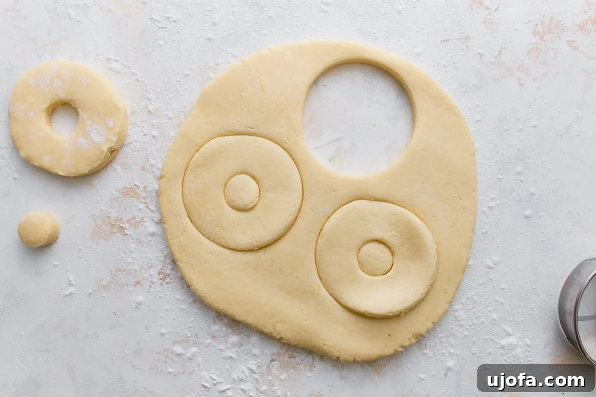 Gluten-Free Mochi Donuts Recipe: Chewy, Crispy & Irresistible 9 Gluten-free mochi donut dough cut into donut shapes before frying