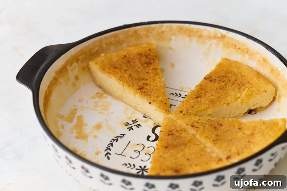 Silky Crustless Custard Pie Recipe: Creamy Baked Custard Delight 8 Gluten-free crustless custard pie sliced in the baking dish