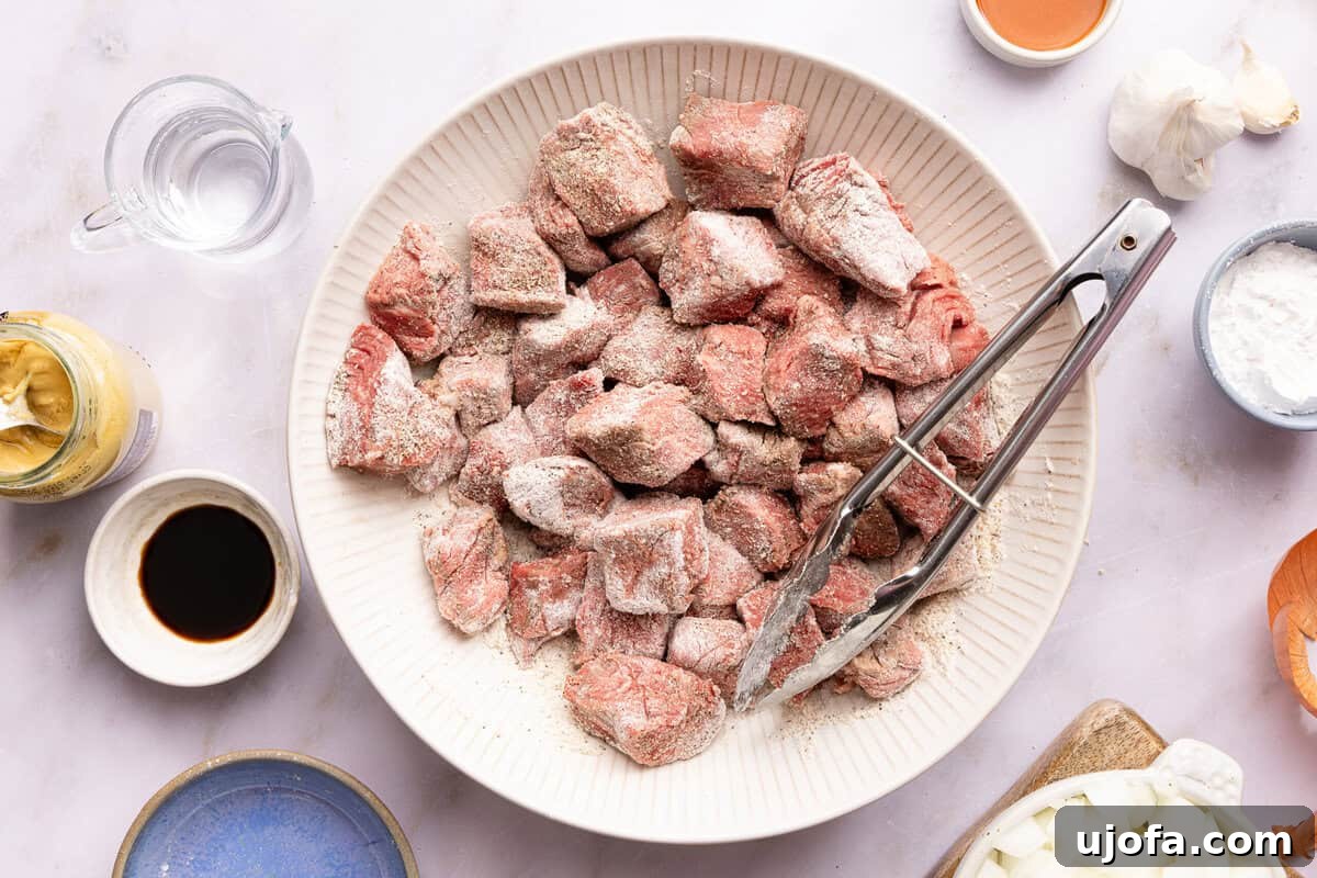 flour-coated beef tips in a bowl