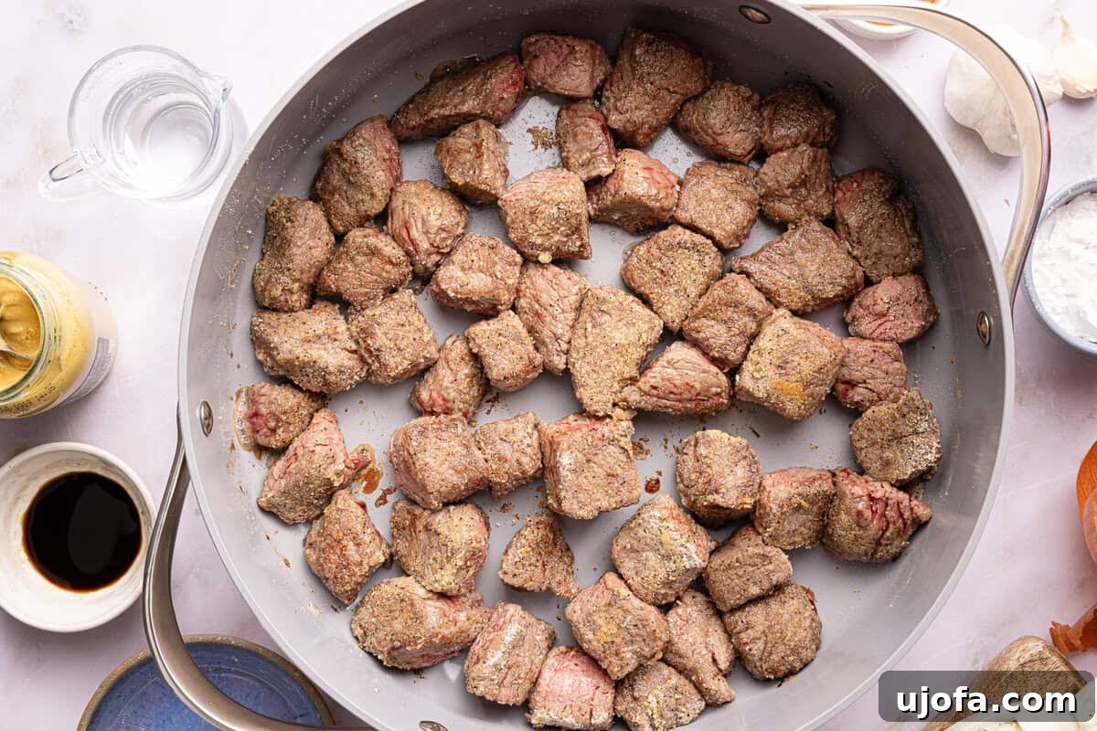 beef tips seared in a pan