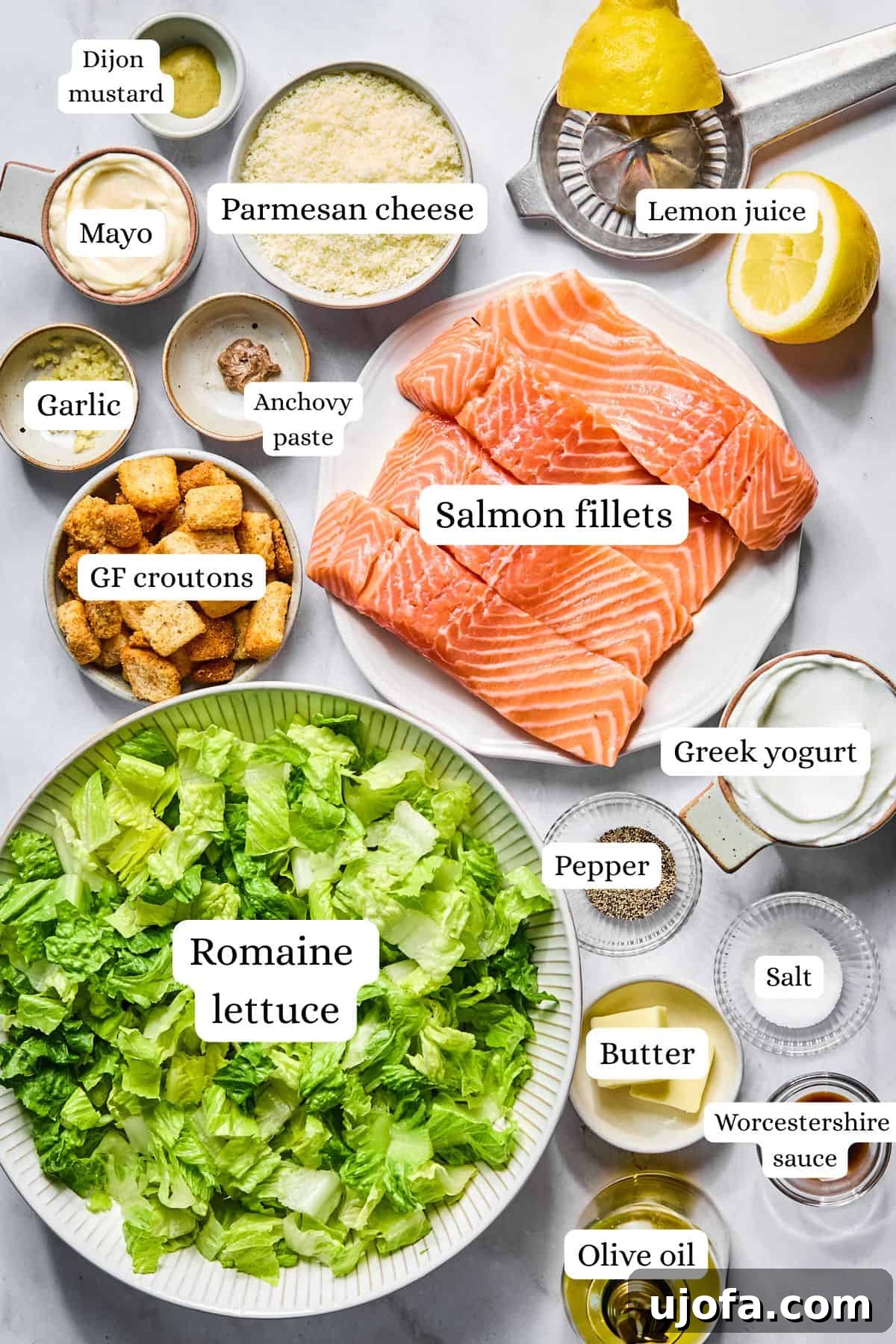 Protein-Packed Salmon Caesar with Creamy Dressing 3 salmon caesar salad ingredients in nesting bowls