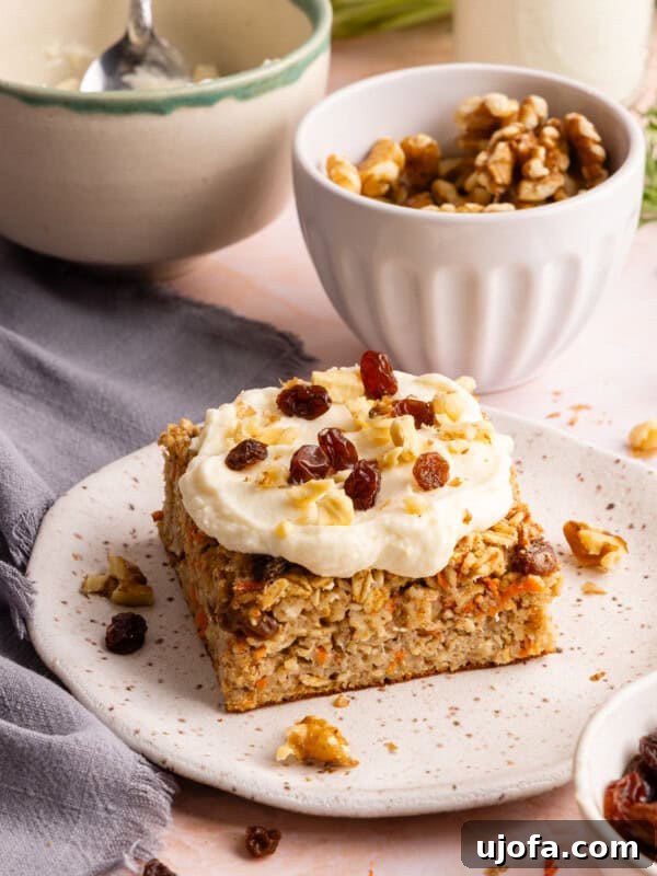 Protein-Packed Apple Pie Overnight Oats 12 carrot cake baked oats with cream cheese frosting on a plate