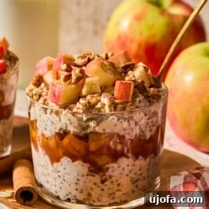 Protein-Packed Apple Pie Overnight Oats 14 apple pie overnight oats with a spoon in it