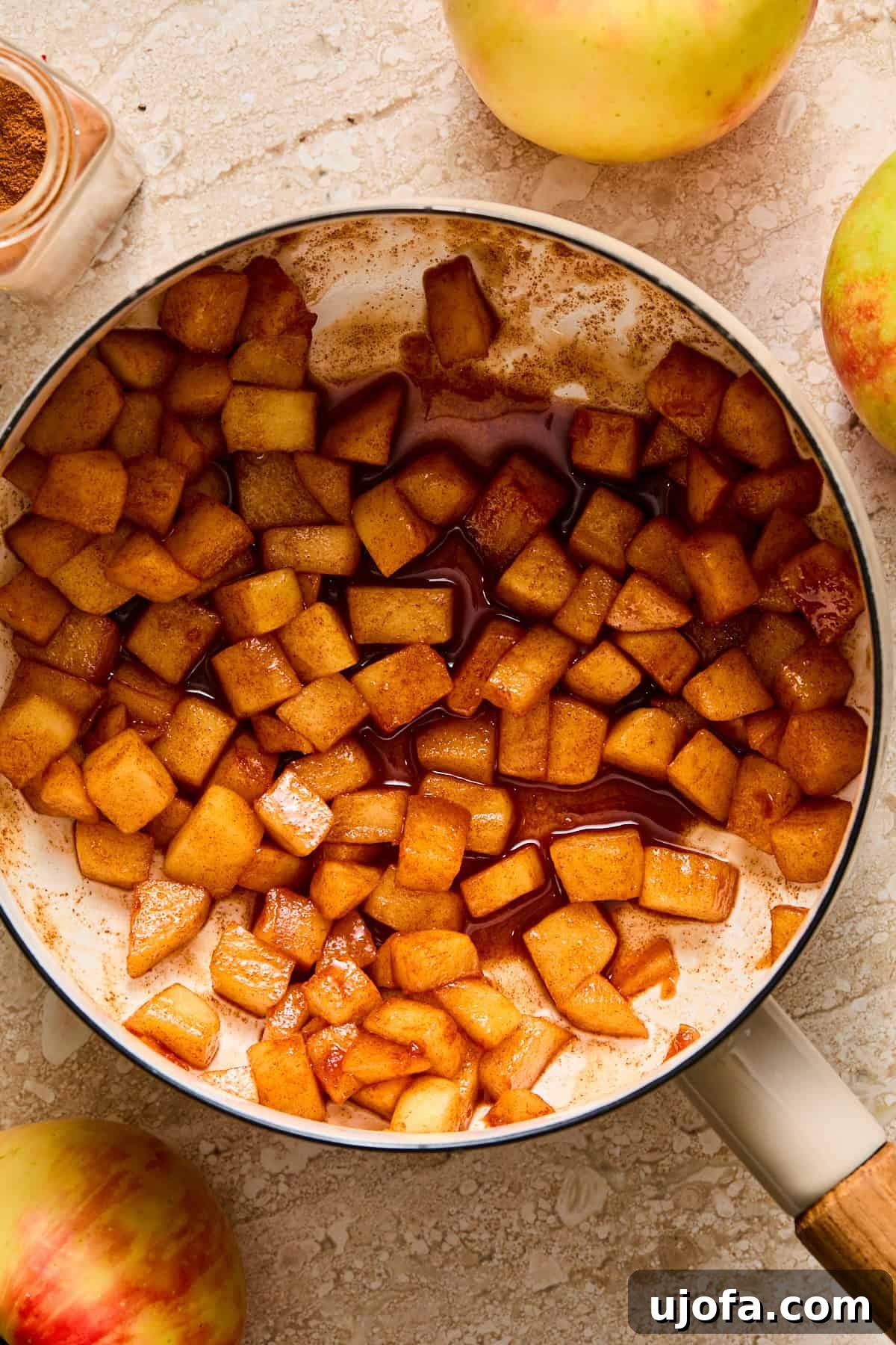 Protein-Packed Apple Pie Overnight Oats 4 caramelized apples in a pot