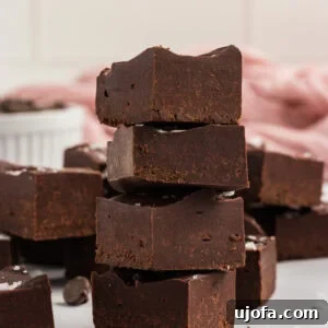 Delicious Gluten-Free and Dairy-Free Dessert Recipes 6 Stack of gluten-free dairy-free chocolate fudge squares topped with flaky sea salt